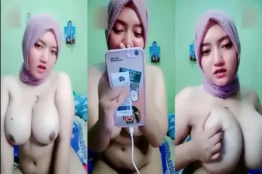 Via Hijab Viral Pamer Susu Mulus Sange